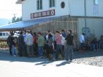 A group of WSI employees gather outside the plant after being told paychecks will be late